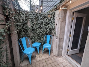 Fun secluded outdoor patio just outside the lower bedroom.