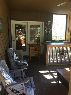 Private screened front porch with fully functional bar.