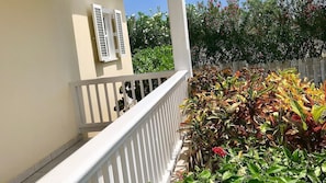 front veranda and view into front west side of garden