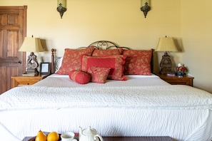 Inviting Master Suite features King Bed, Large Windows and a Door to the Patio