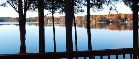 View from deck looking over our dock on a still day in last days of October.