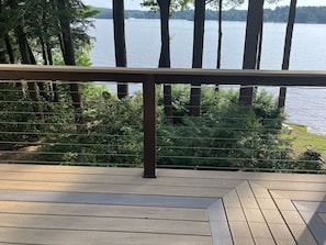 New synthetic deck with cable railings has improved the view from the deck.