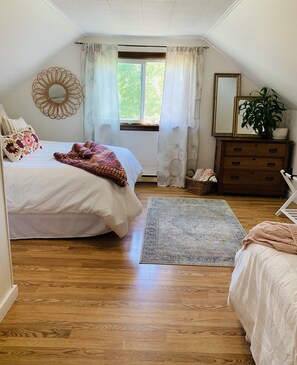 Front bedroom has a queen and full bed with plenty of room to spare.