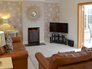 Comfortable living room | May Cottage, Bacton, near North Walsham