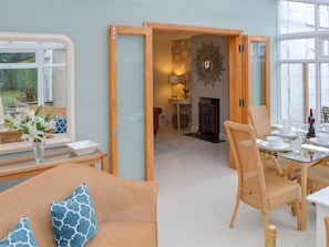 Light and airy conservatory/ dining room | May Cottage, Bacton, near North Walsham
