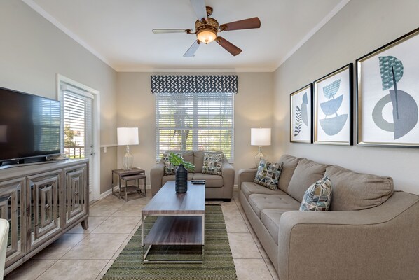 Spacious living area with TV for entertainment where you can have your friends and family with you