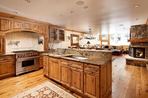 Fully stocked Gourmet Kitchen - with open floor plan.