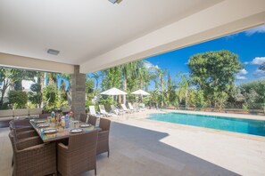 Outside dining area and Pool