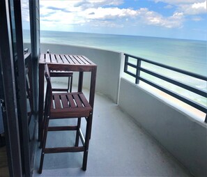 Bar height table to get full view of ocean.
