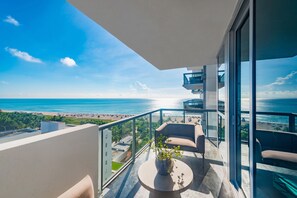 Balcony with double club chairs