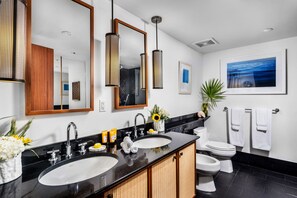 Master bathroom with double sinks and bidet