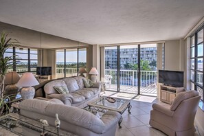 Relax on the couch and watch the flat-screen cable TV.