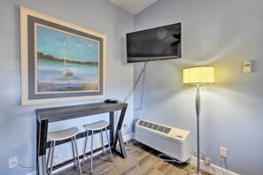 Watch your favorite shows or movies on the flat-screen TV.
