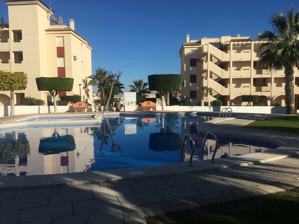 Communal pool area. Apartment a couple of blocks away from pool
