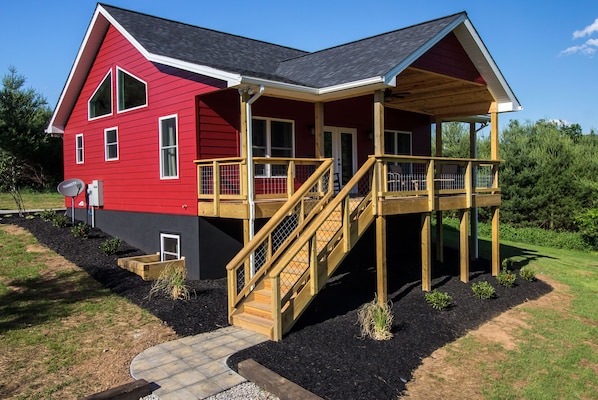 Charming exterior of the Red Pine Cottage.