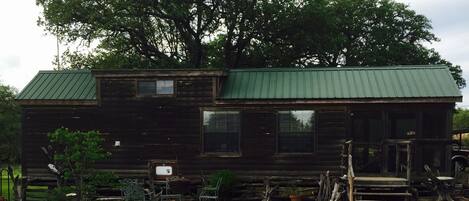 Log cabin style with screened in front porch