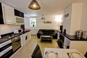 Modern high specification apartment located on the ground floor with log burner.