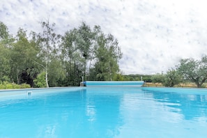 piscine chauffée à 29° de Mai à Septembre.