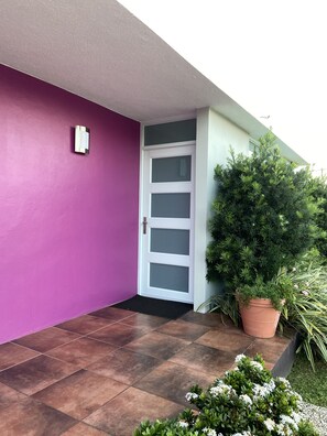 Security doors and locks.
Enter from street.
Balcony in front of light post.