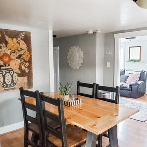 Kitchen dining table (extra chairs in living room closet if needed)