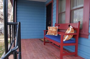 Front porch perfect for relaxing morning, noon and night.
