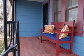 Front porch perfect for relaxing morning, noon and night.