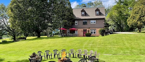 Firepit and big lawn at The Reunion House