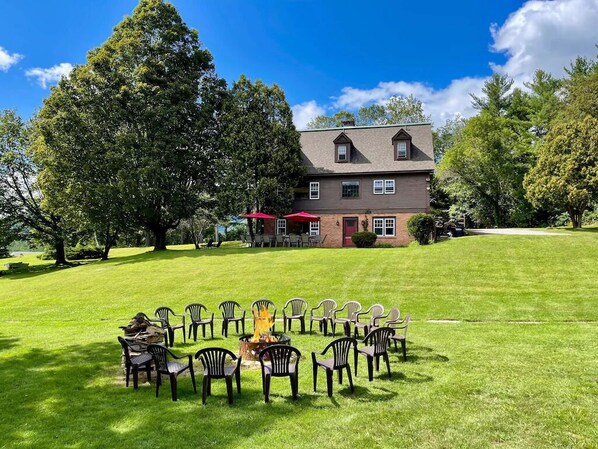 Firepit and big lawn at The Reunion House