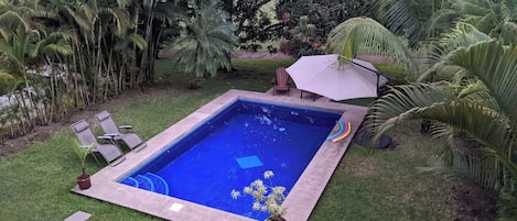 View of pool from upper balcony - Two master bedrooms up, one master down 