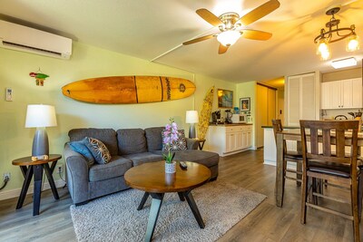 Living room with our signature surfboard wall