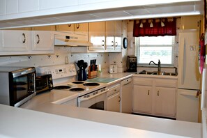 Looking through the high-bar into the kitchen.