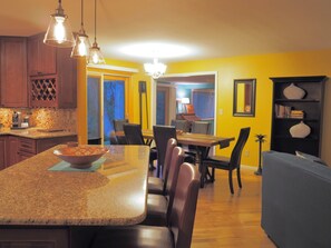 kitchen bar seating and formal dining area
