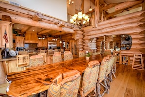 Dining table with Kitchen in background