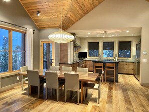 Open floor dining/kitchen with fully stocked kitchen.