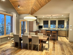 Open floor dining/kitchen with fully stocked kitchen.