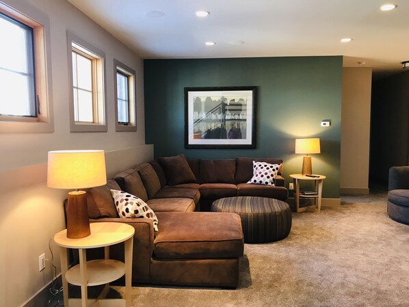 Cozy lower-level family room and two bedrooms and baths, plus laundry.