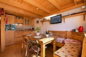 Dining area & kitchen with HDTV