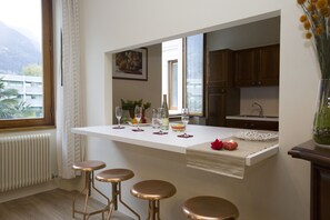 The living room with a breakfast bar