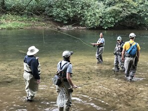 Trout fishing in front of our cabin 