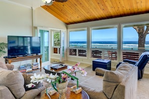 Views from the living room.  New 65' TV. This is your Beachfront home. 