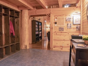 Main Level Entry, mud room with extra storage and on site laundry