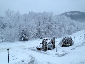 Looking down at the front parking lot from balcony.