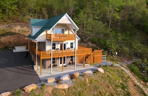 Summer drone photograph of Shenandoah Manor adjacent to George Washington National Forest