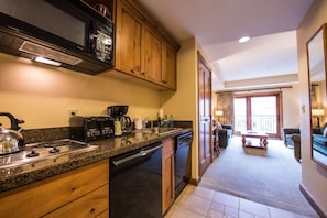 The kitchen comes equipped for your convenience.