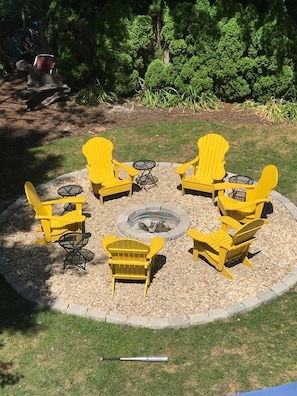view of the updated firepit from 2nd King bedroom balcony, overlooking backyard