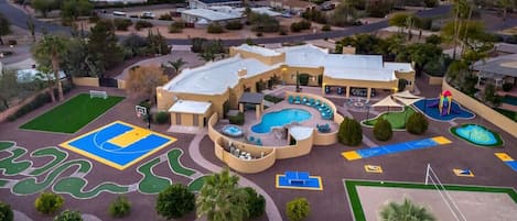 [Resort Property] Aerial View of the amenities including heated pool, basketball court, mini golf, sand volleyball, splash pad, and more!