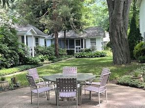 patio and front yard of Cottage 4 (pictured on left)