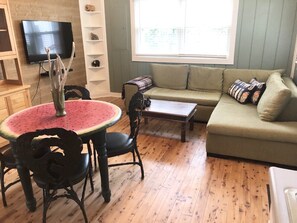 main living space w sectional couch pull out twin bed