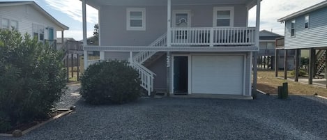 New vinyl siding and windows. The house looks brand new. Enclosed downstairs.