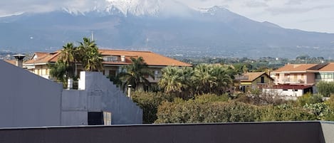 view of Mount Etna from the wide terrace of the house